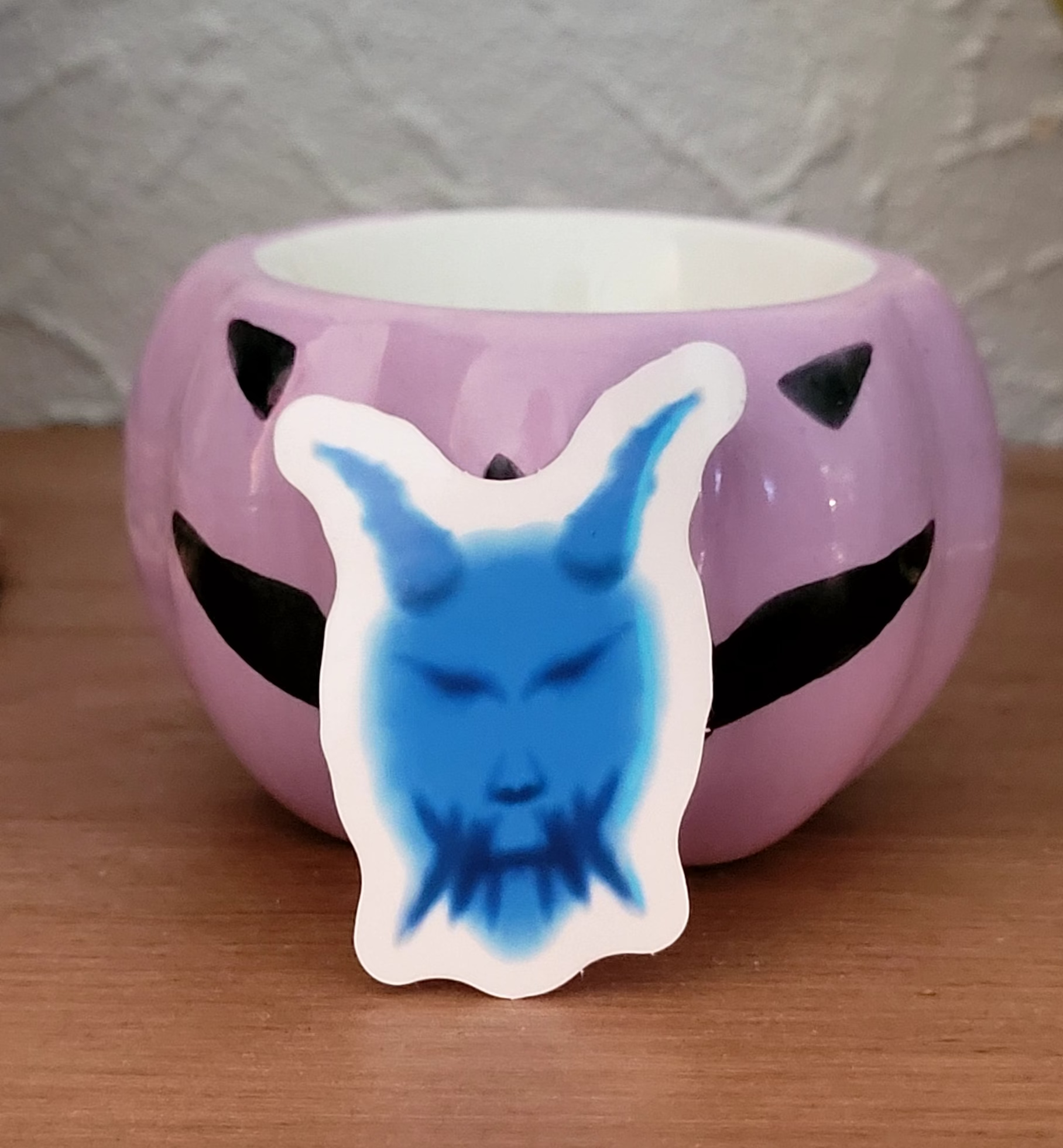 Masque ONI logo Mélokai